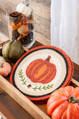 Fall side table with pumpkin trivet, hand stenciled art with orange and black border.