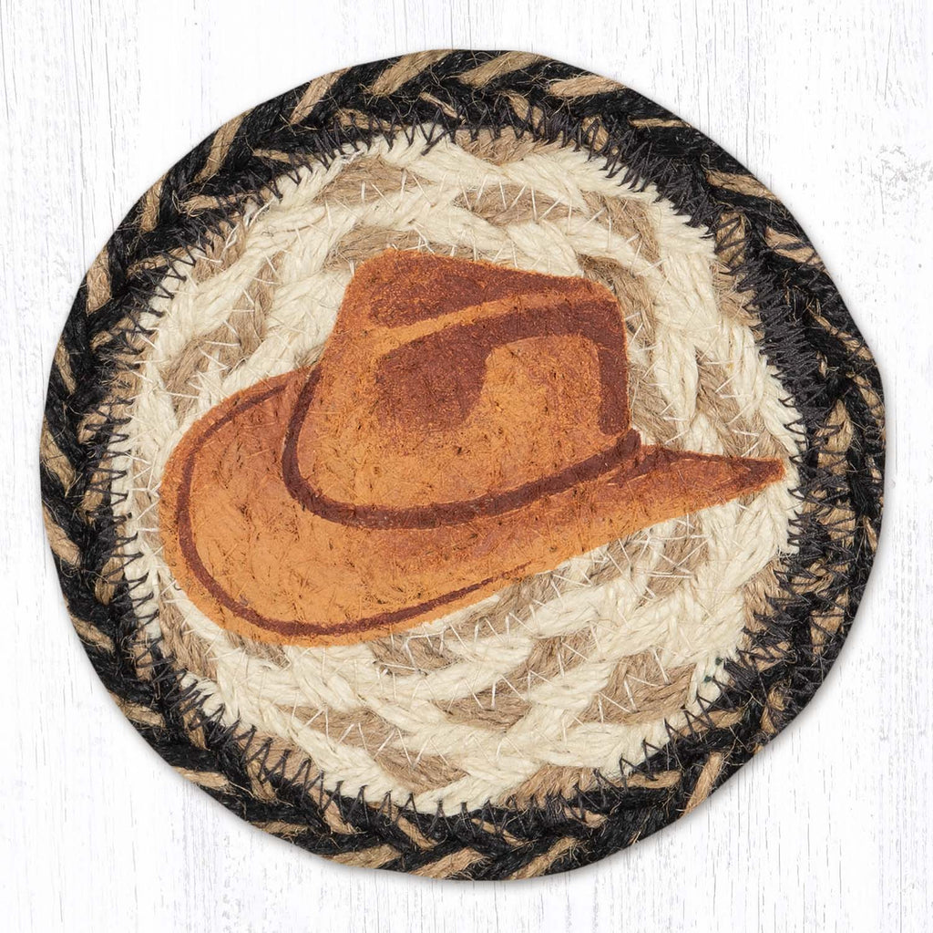 coaster with tan cowboy hat design with black and tan border. 