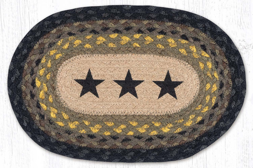 10"x15" placemat or trivet with three black stars in center with black, tan, and mustard braided jute. 