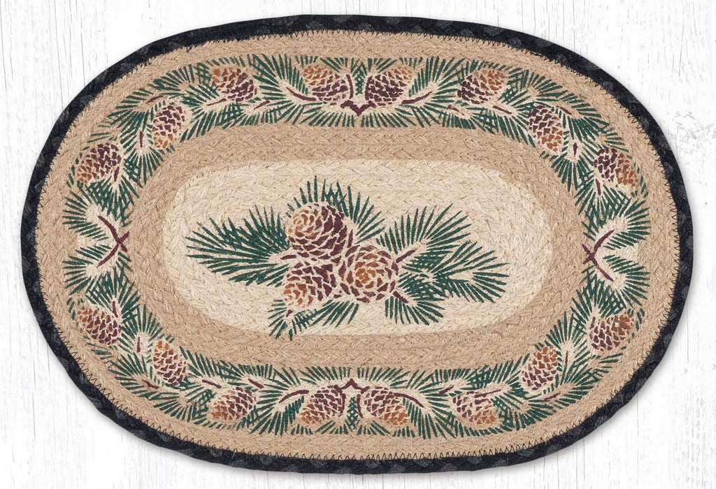 Oval placemat with green and gold pinecone design border and in center with tan and grey braided jute.