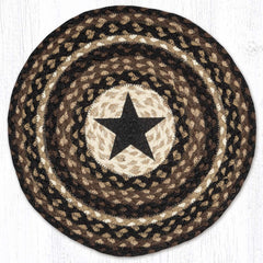 Round placemat with black star in center made from braided jute in black, brown and tan colors. 