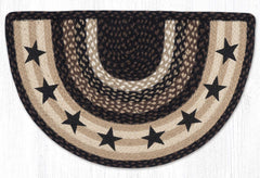 Slice rug with star design in black, brown and tan colored braided jute. 